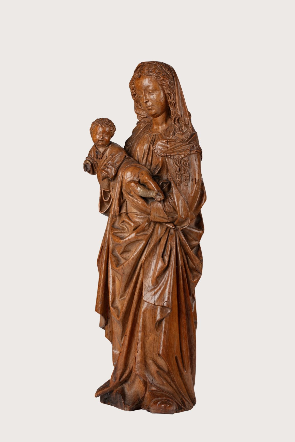 Meester van de Utrechtse Stenen Vrouwenkop Maria met kind zijkant